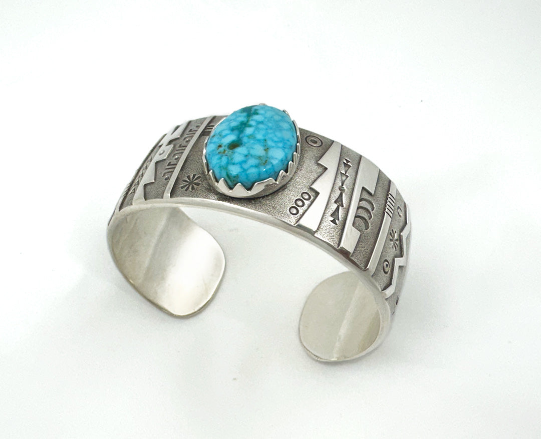 Kingman turq and sterling silver bracelet by Norbert Peshlakai, Navajo