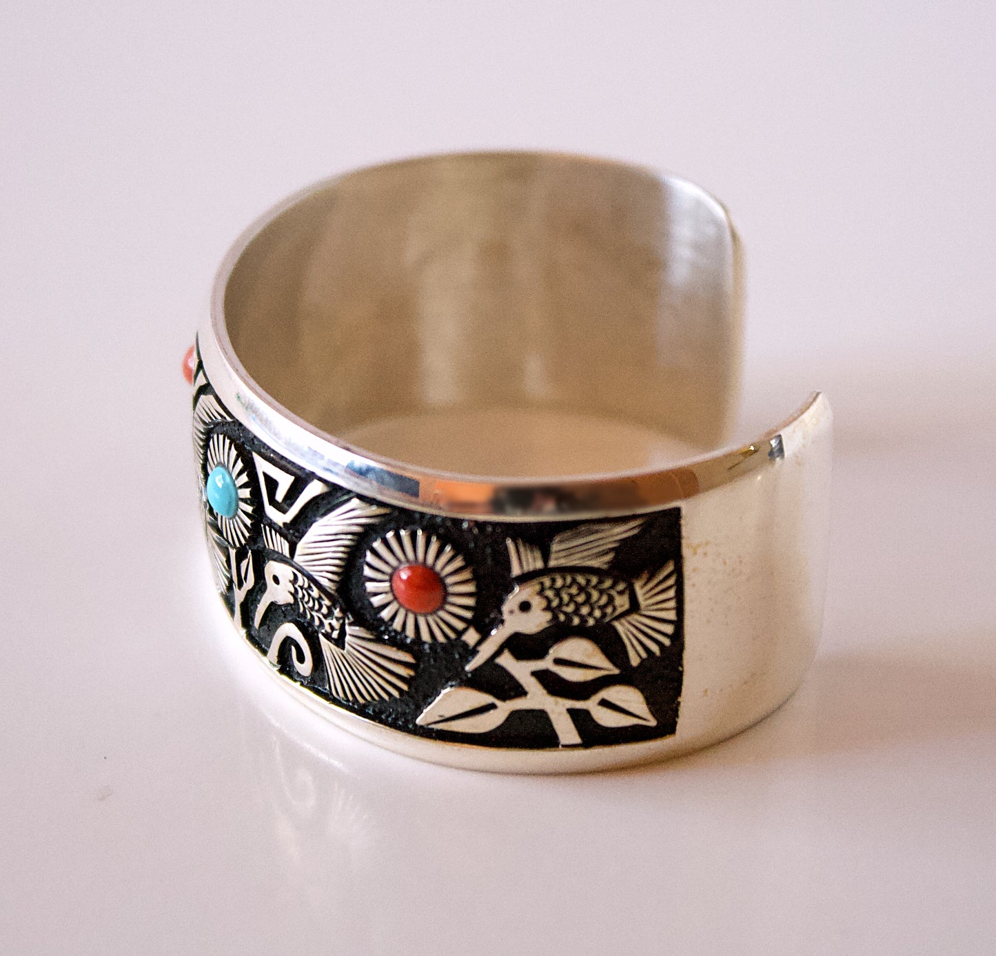 Silver Bracelet with Hummingbirds and Flowers by Philbert Begay - Navajo