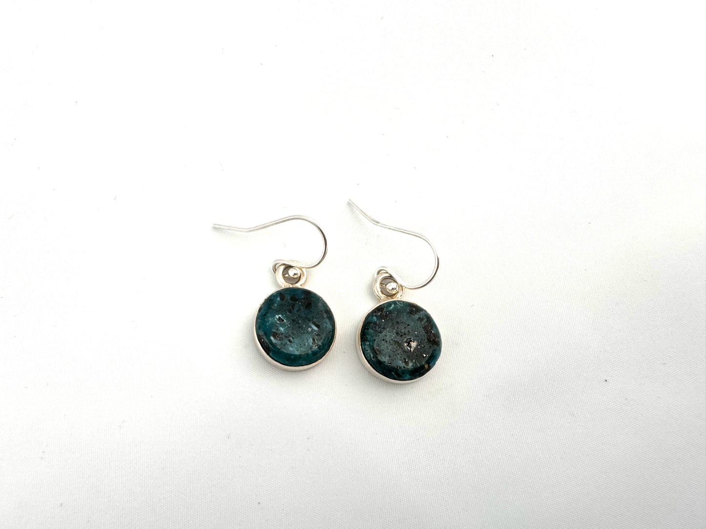 Silver and turquoise earrings by Causanda Dukepoo (Taos)