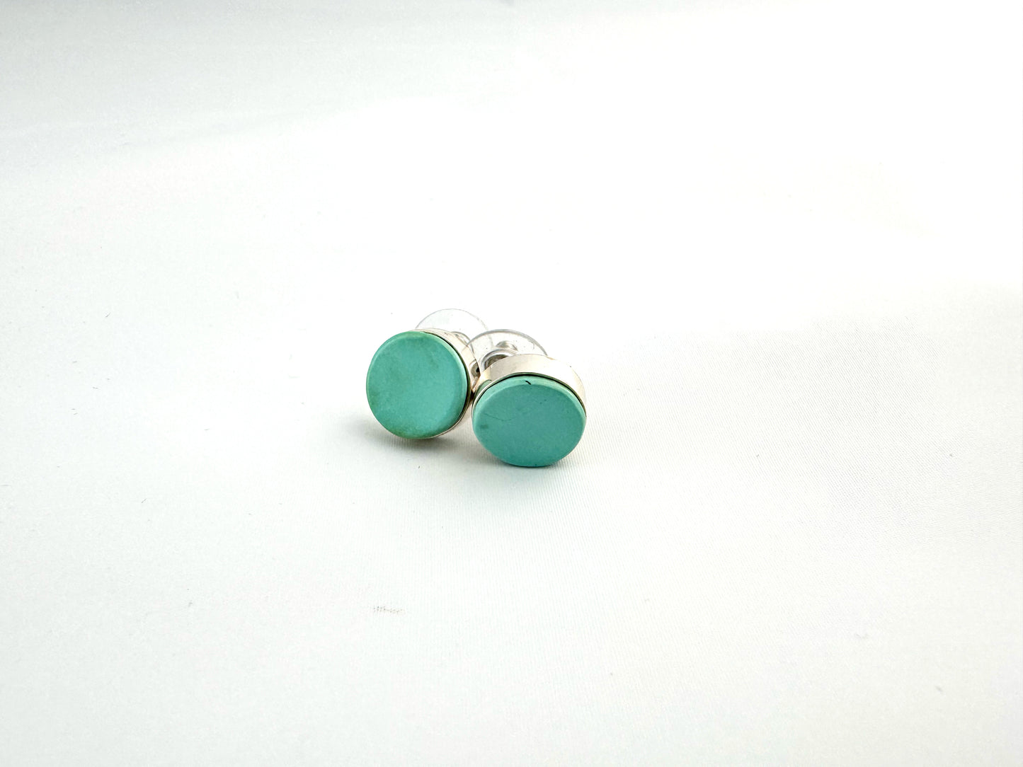 Silver and turquoise studs by Causanda Dukepoo (Taos)