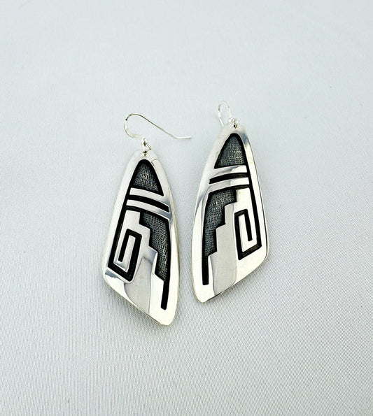 Abstract design earrings by Anderson Koinva