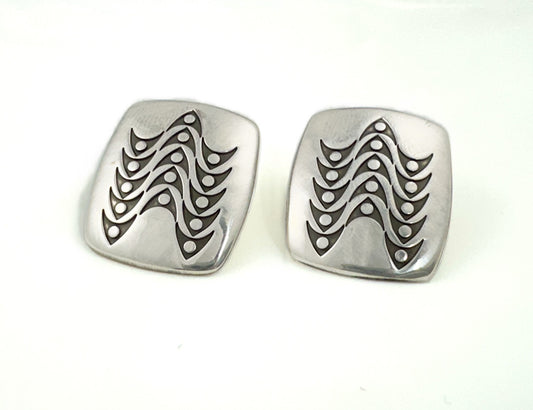 "Wave" sterling silver earrings by Norbert Peshlakai, Navajo