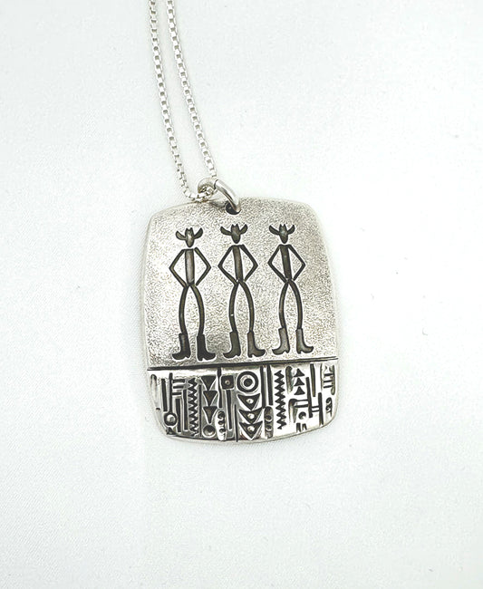 "Buddies" sterling silver pendant by Norbert Peshlakai, Navajo