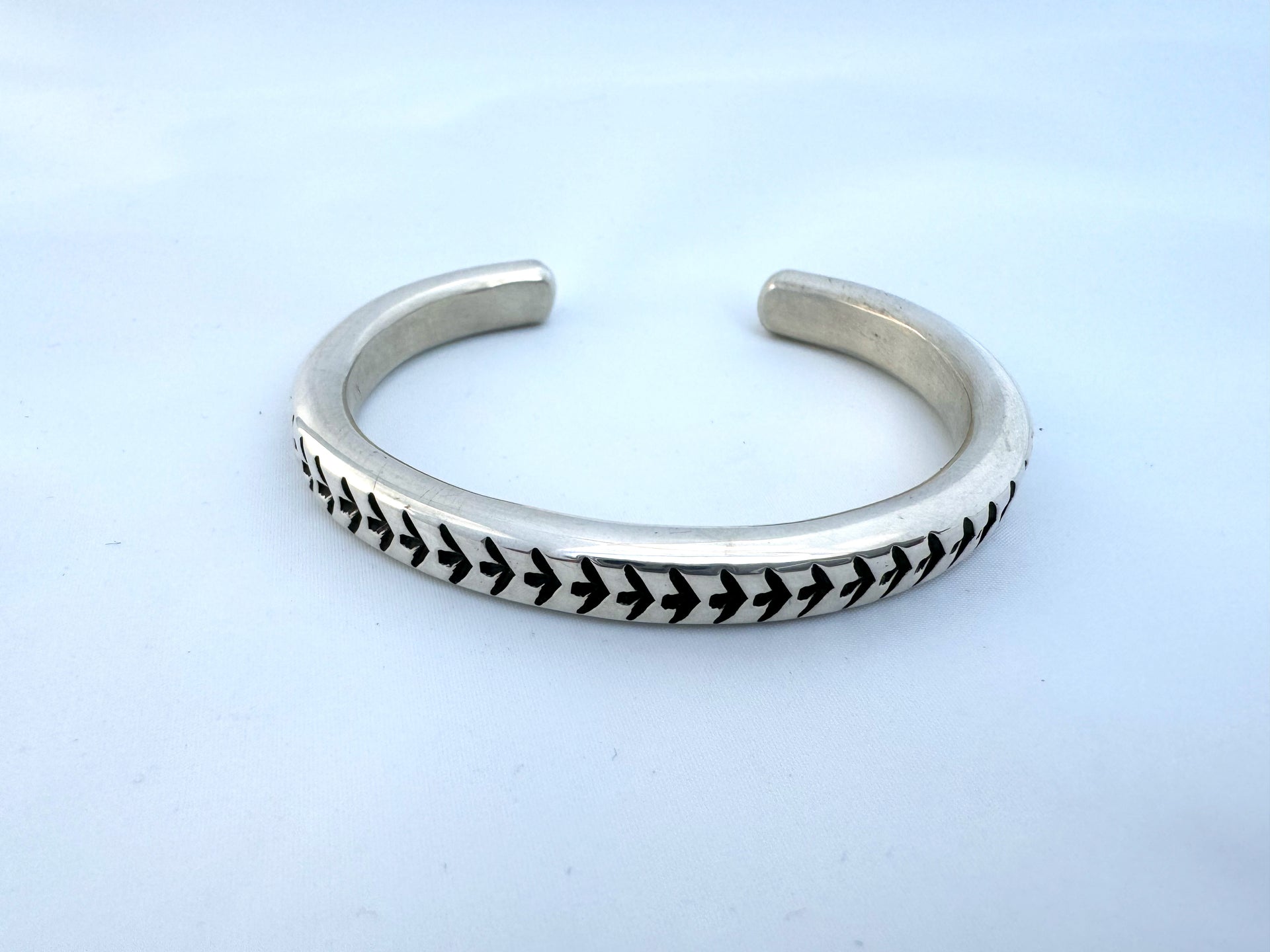 Stamped Bracelet by Waddie Crazyhorse (Cochiti) – Case Trading  