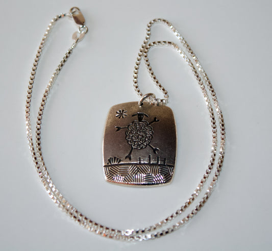 "Happy Sheep" Pendant by Norbert Peshlakai - Navajo