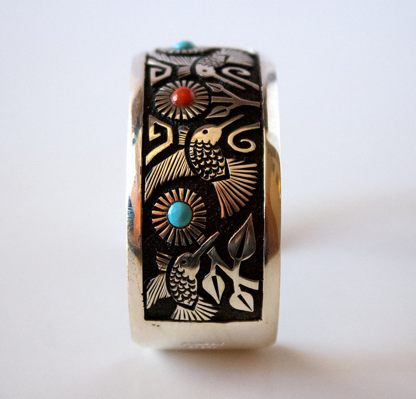 Silver Bracelet with Hummingbirds and Flowers by Philbert Begay - Navajo
