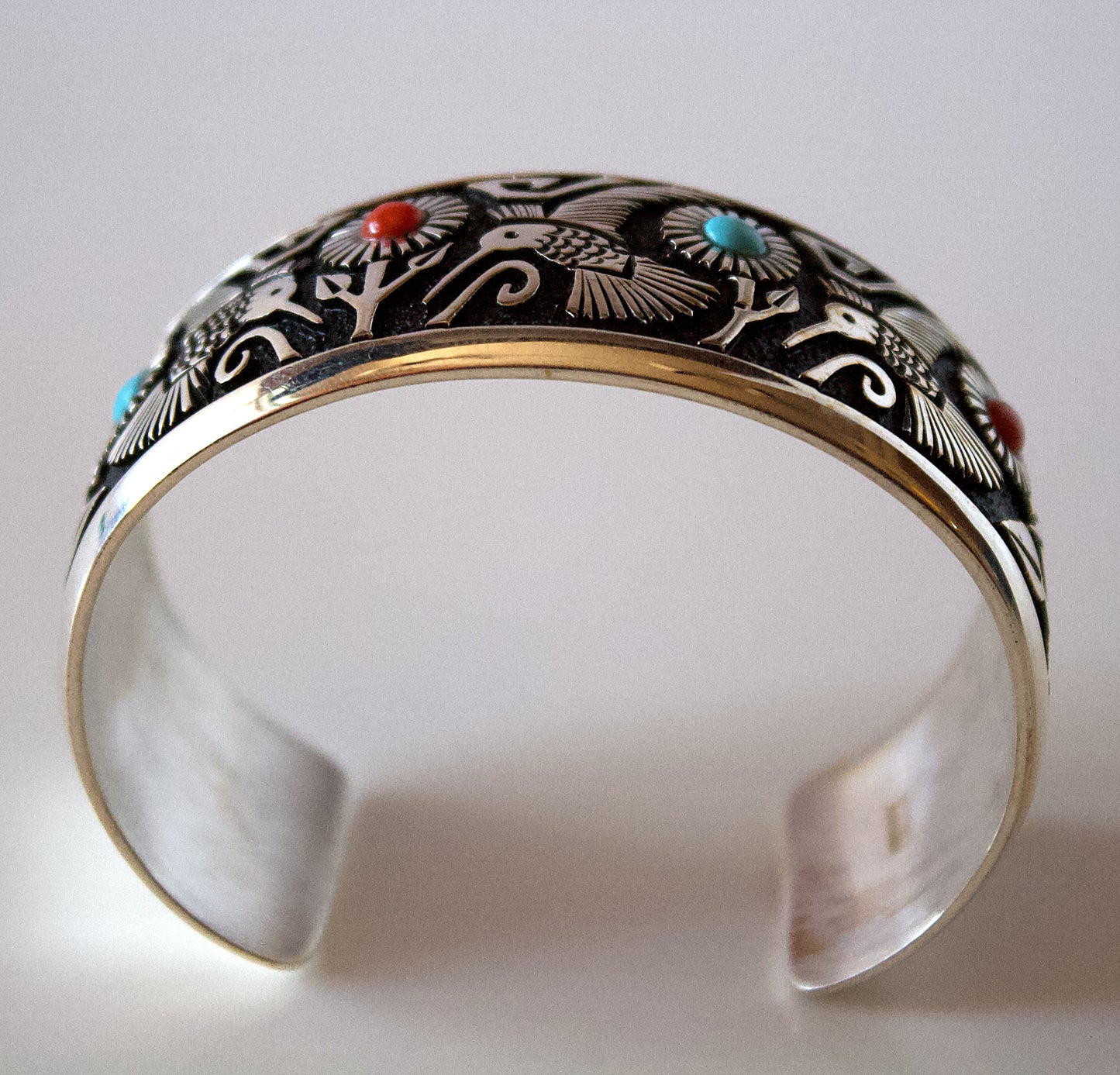 Silver Bracelet with Hummingbirds and Flowers by Philbert Begay - Navajo