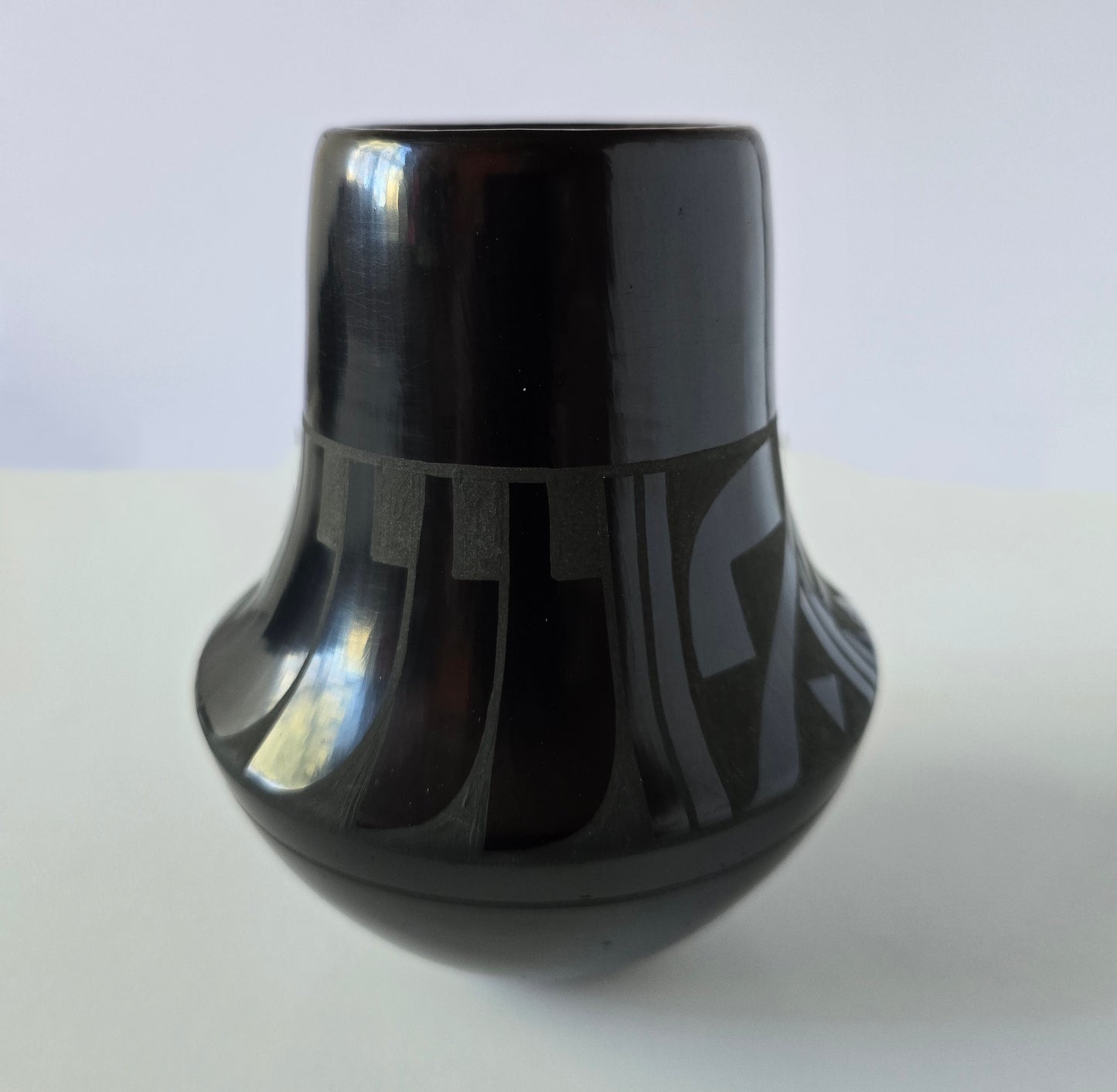 Small Green on Black Jar by Eric Fender (Than Tsideh) - San Ildefonso